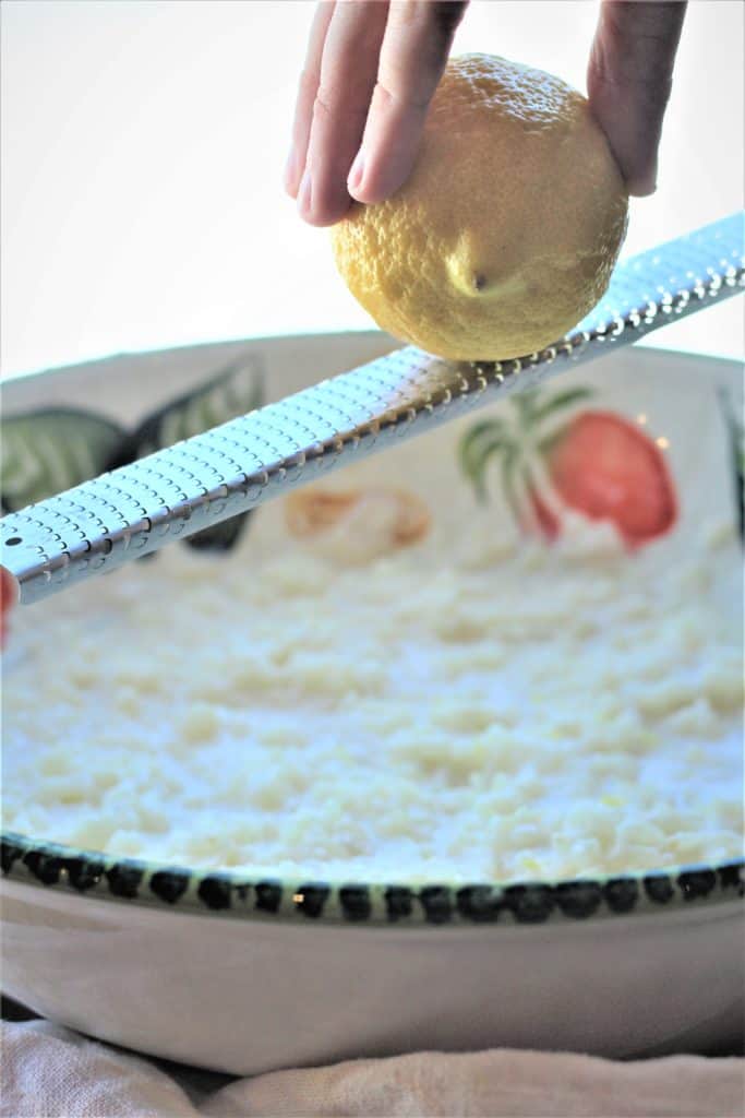 adding lemon zest to rice for Easy No Crust Easter Pastiera