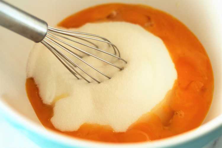 mixing bowl with eggs and sugar for nonna's sponge cake