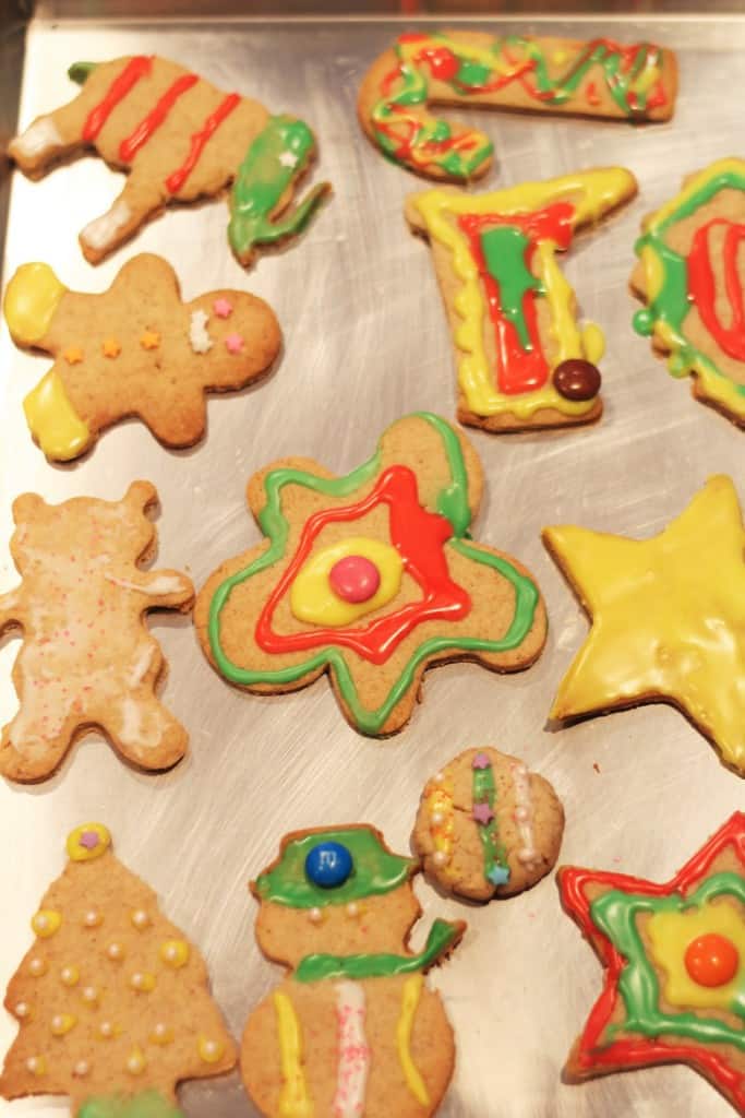 baking sheet with decorated Christmas cookies