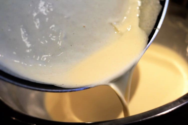 pour crepe batter into a hot pan