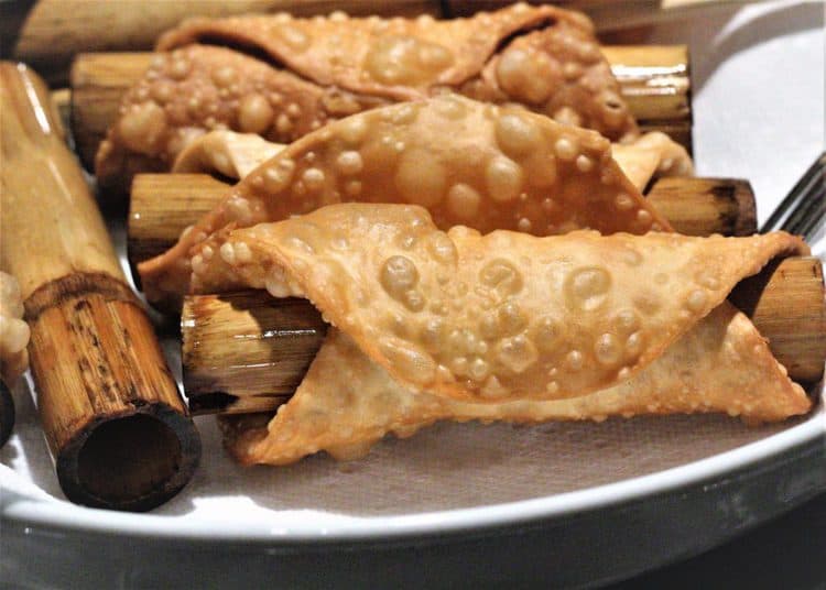 fried cannoli shells wrapped around dowels