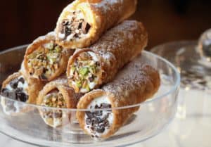 plate piled with sicilian cannoli