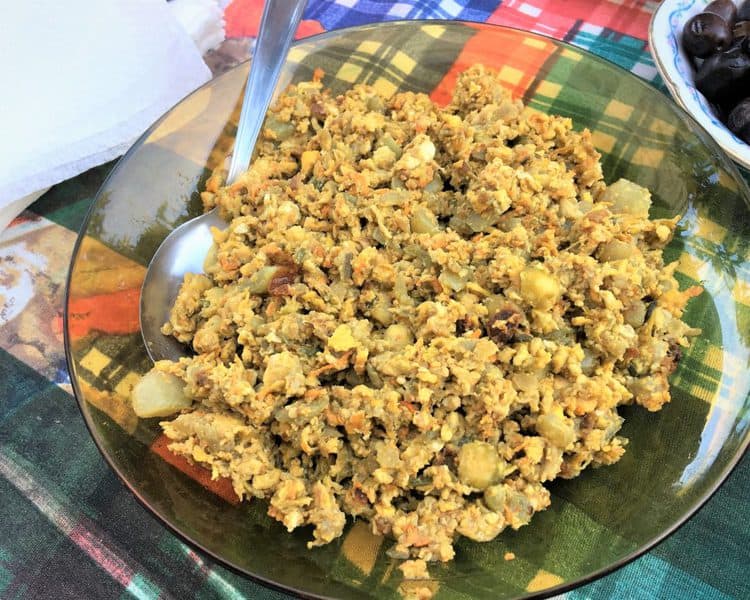 green glass plate with zucchini blossom and egg scramble 