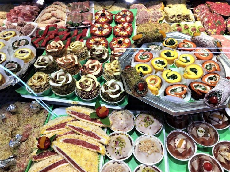 assorted meat display from a grocery store