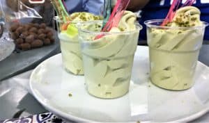 3 cups of pistachio ice cream on tray