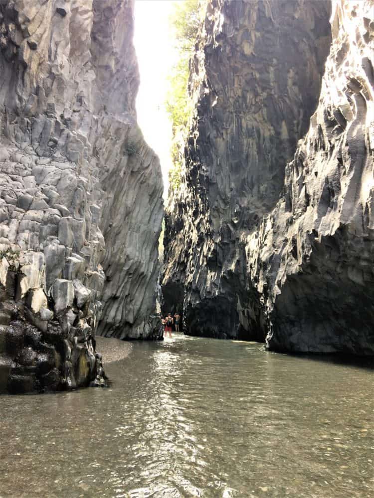 water and cliff view of Gole d'Alcantara