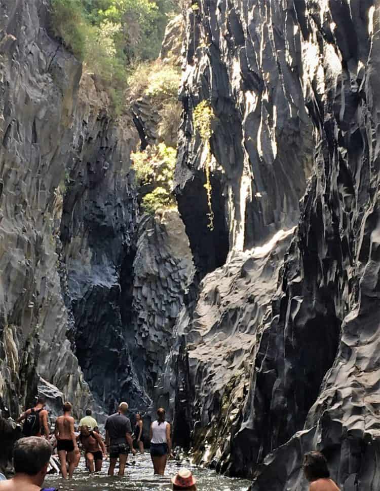 people walking through the gorges of Gole d'Alcantara