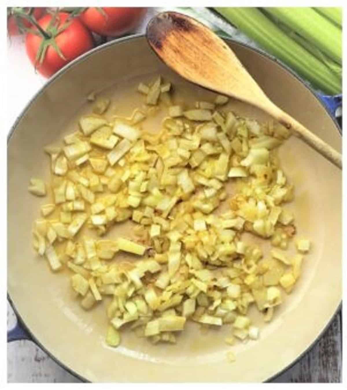 Sautéed onion in skillet for caponata recipe.