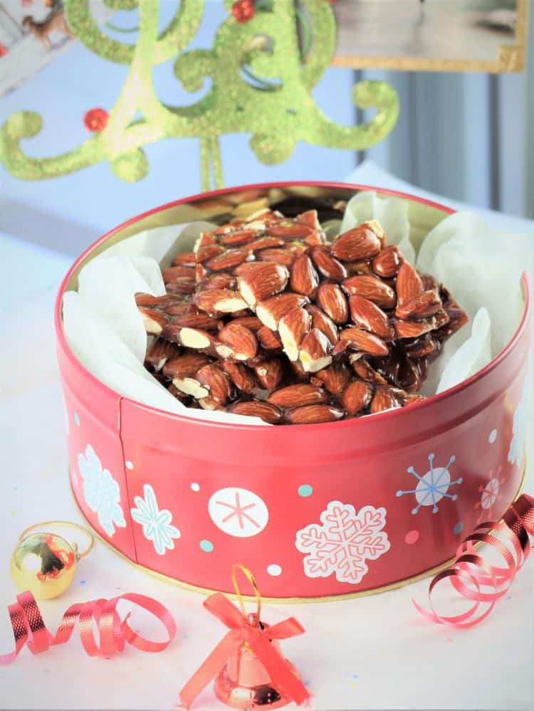 Christmas tin filled with Sicilian almond torrone