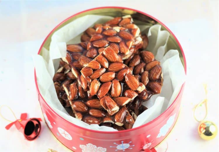 Christmas tin filled with Sicilian almond torrone