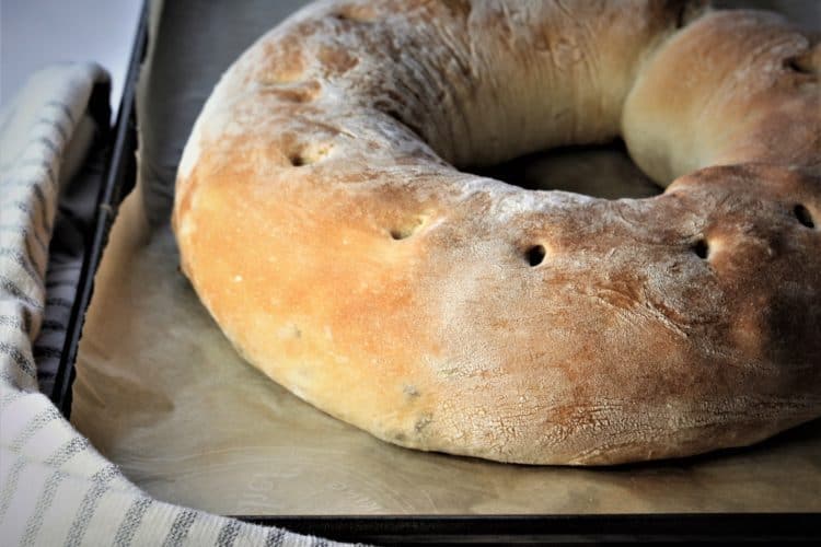 round wheel of Sicilian sausage bread fresh out of the oven