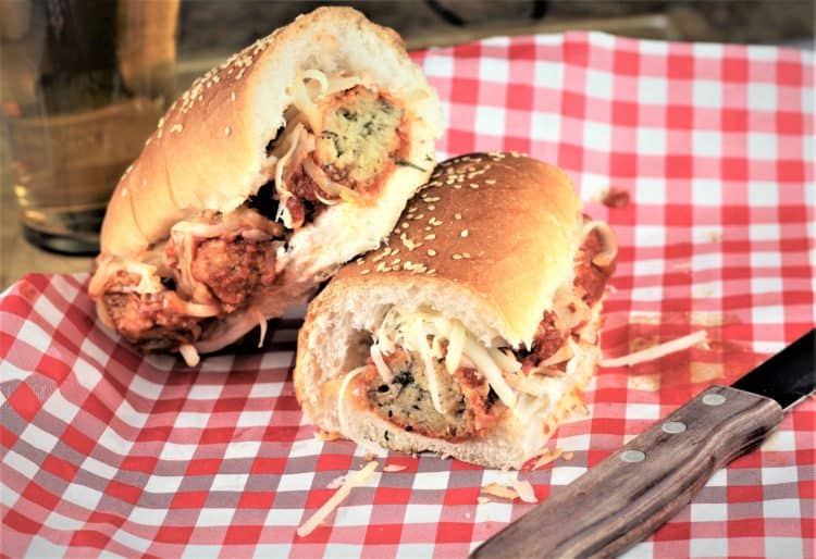 Eggplant Meatball Subs with Smoked Caciocavallo cut in half 