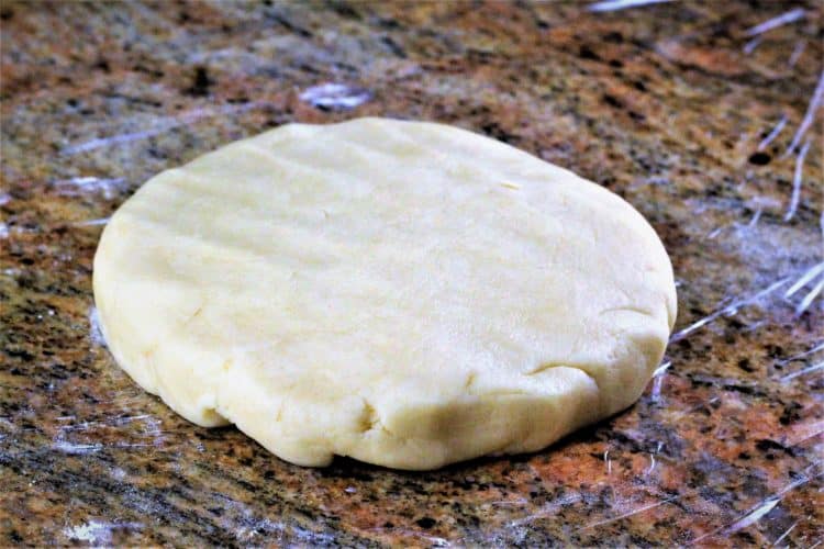 crostata dough flattened in a dish shape