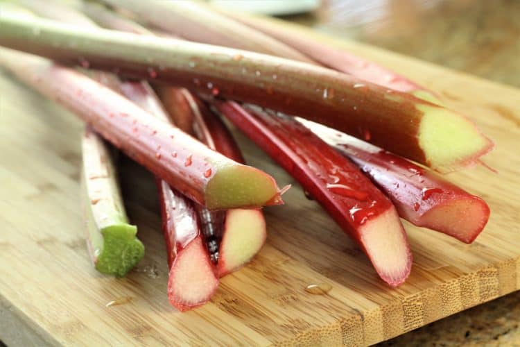 cut rhubarb stalks with drops of water clinging to them