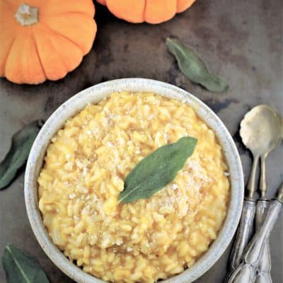 bowl of roasted pumpkin risotto with crispy sage leaf