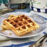 Yeasted Waffles drizzled with maple syrup