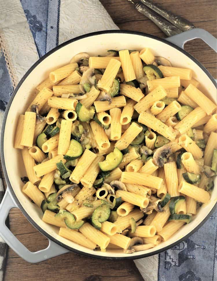 overhead view of pan filled with zucchini mushroom pasta
