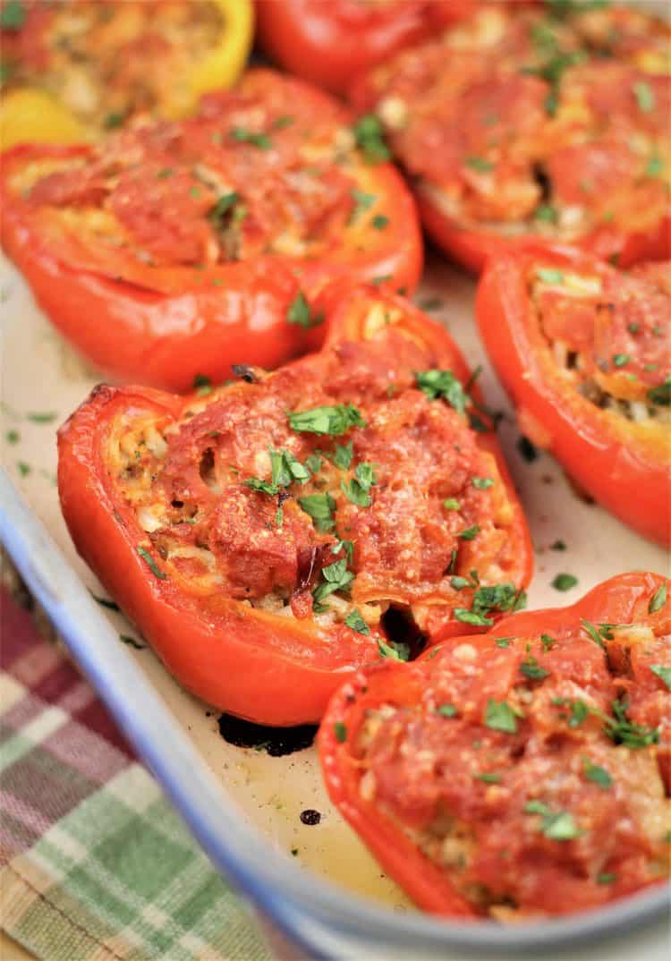 stuffed red pepper halves with meat and rice out of the oven