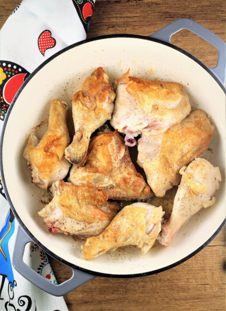 browning chicken pieces in large skillet