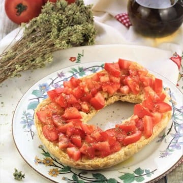 Hard Bread served with tomatoes olive oil and oregano