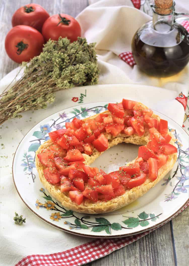 Hard Bread served with tomatoes olive oil and oregano
