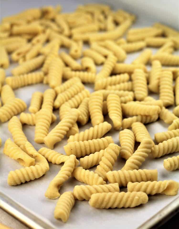 completed cavatelli on a baking sheet