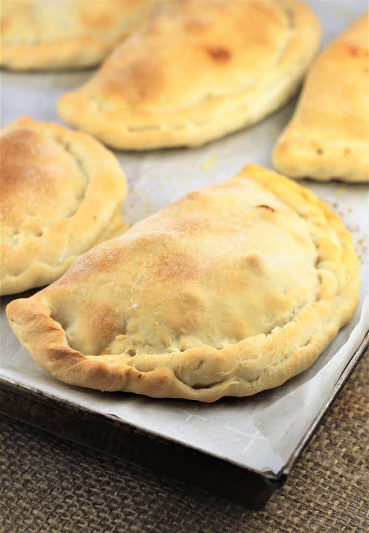 baked pitoni Messinesi on baking sheet