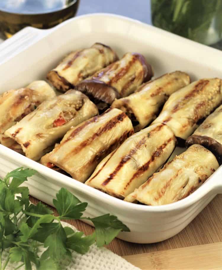 white baking casserole filled with Grilled Eggplant Involtini