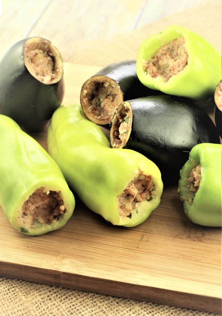 hollowed out peppers and eggplant with meatball filling