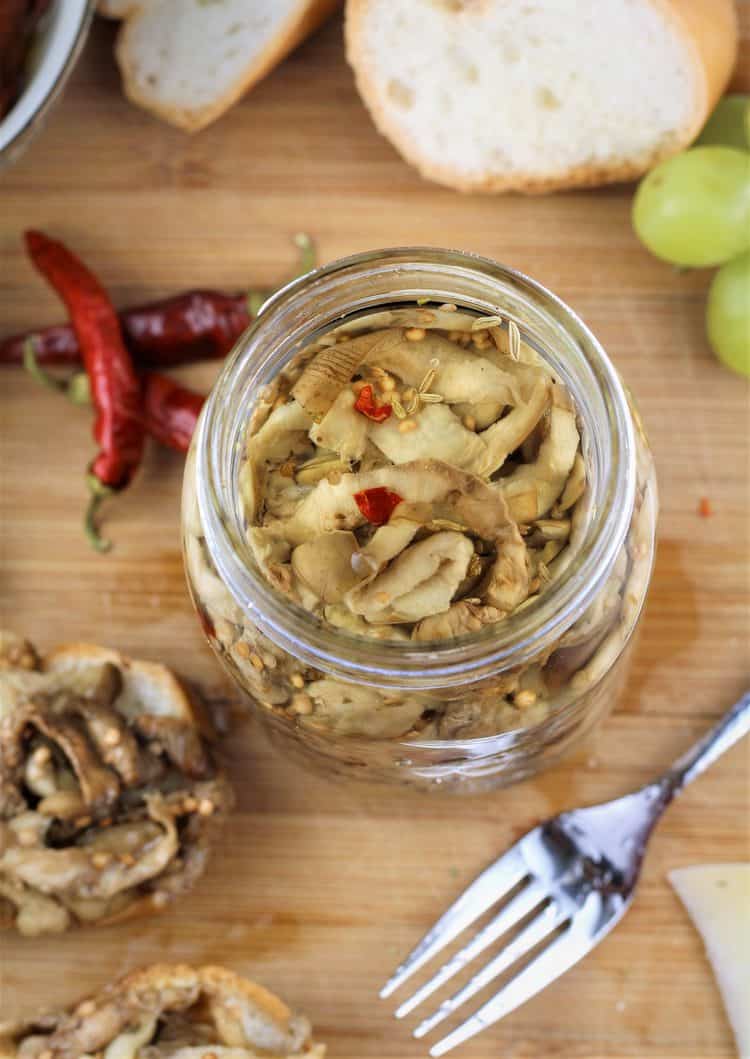 overhead view of jar of pickled eggplant