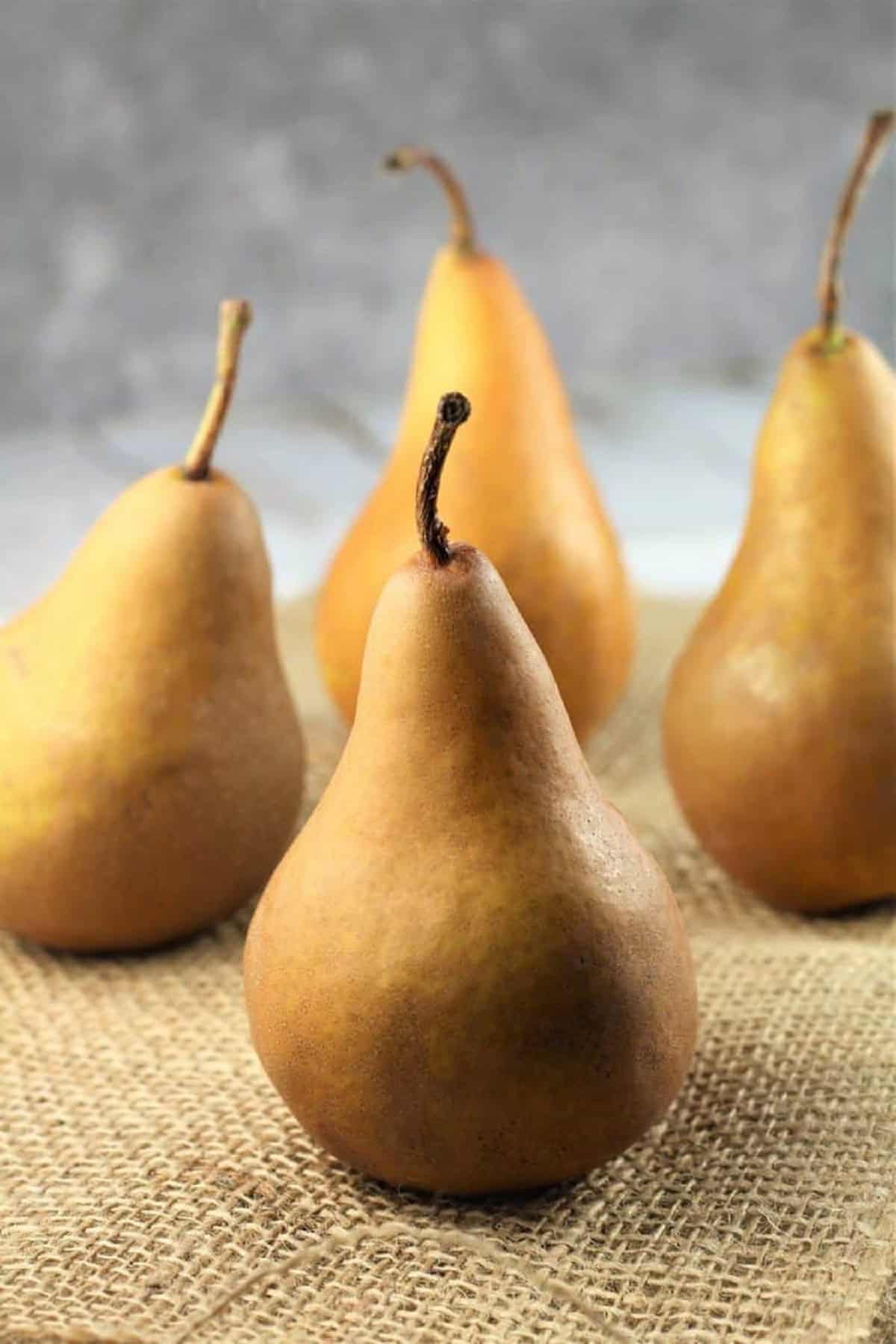 Pears Poached in Red Wine Four whole bosc pears.