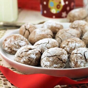 Chocolate espresso amaretti cookies on plate.
