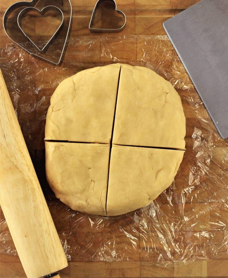 dividing cookie dough into 4 pieces 