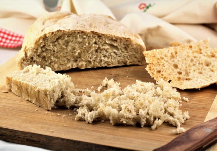 loaf of Italian bread hand torn into small pieces