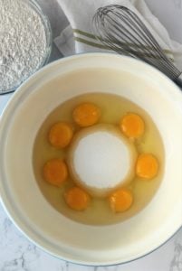 eggs and sugar in large mixing bowl