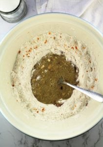 mixing bowl with flour mixture and eggs, Marsala mixture stirred in the center