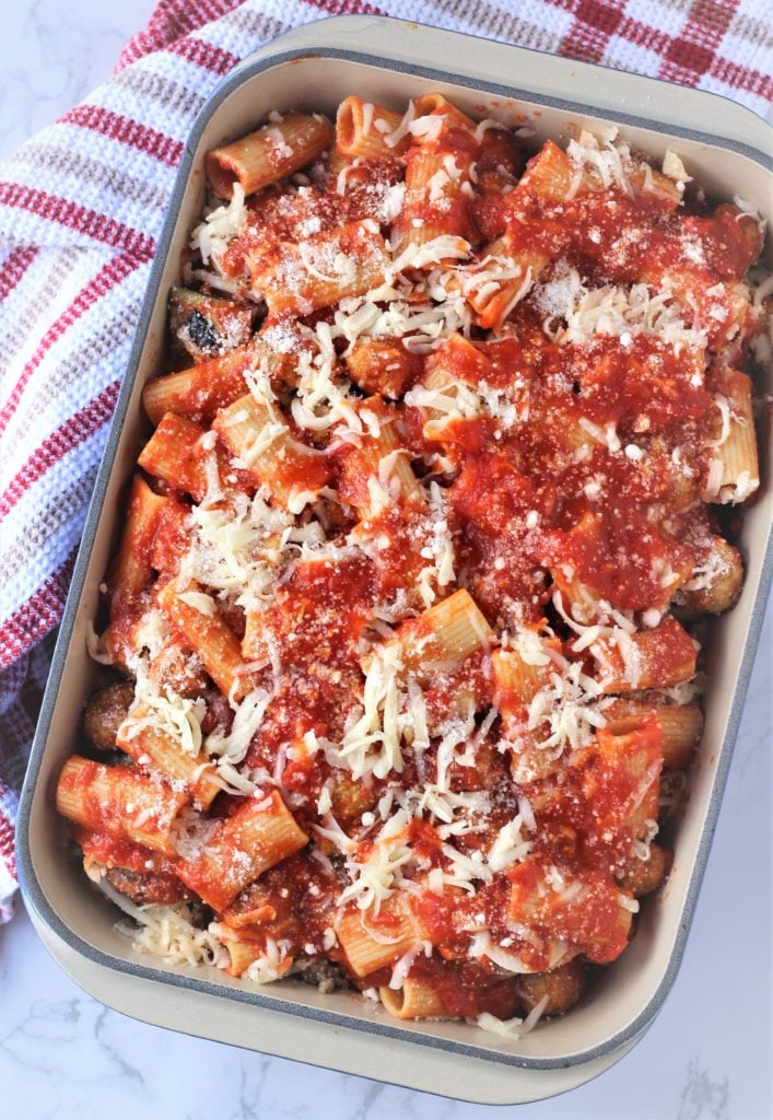 rectangular baking dish filled with baked pasta 