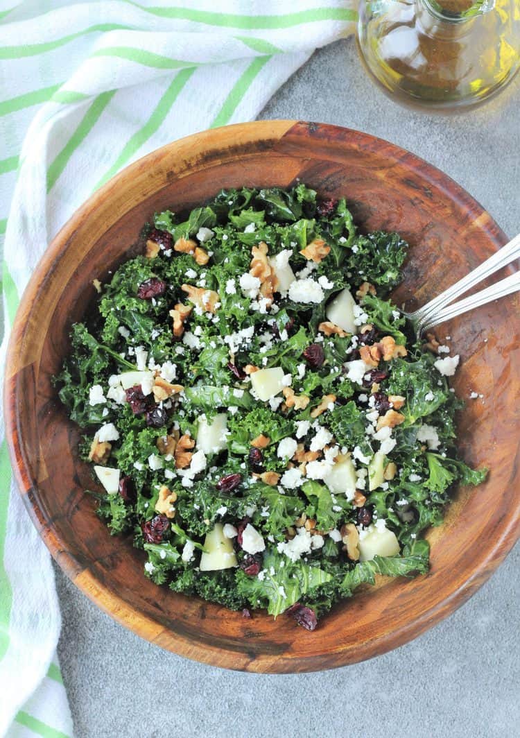 kale salad in large wooden salad bowl