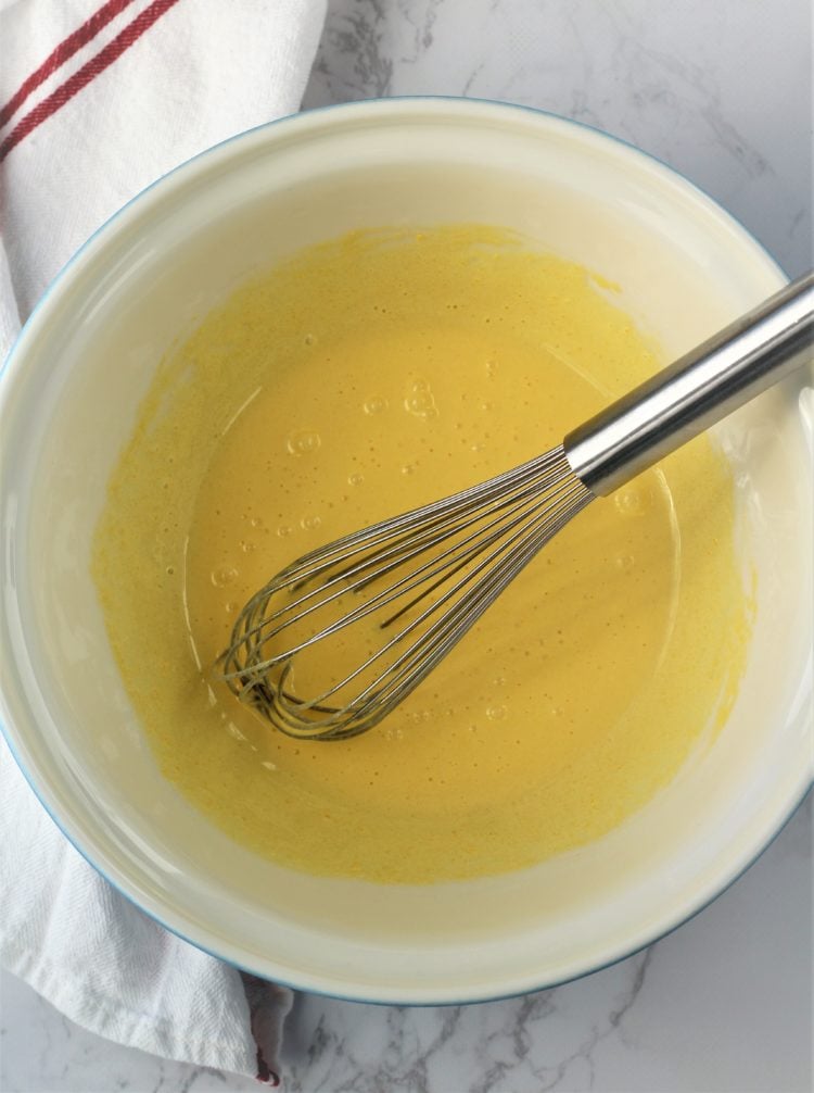 whisked egg yolks in bowl