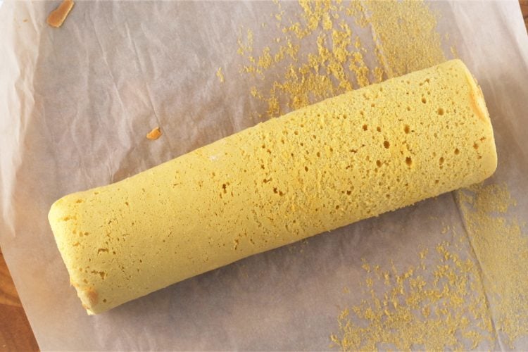 rolled sponge cake on parchment paper