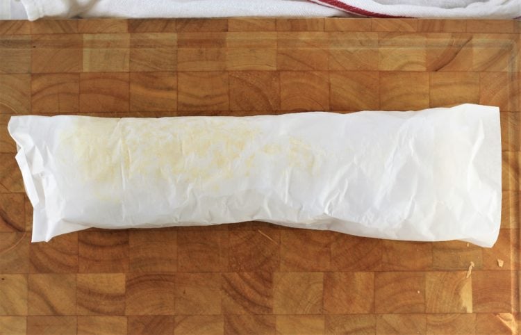 parchment paper wrapped roll cake