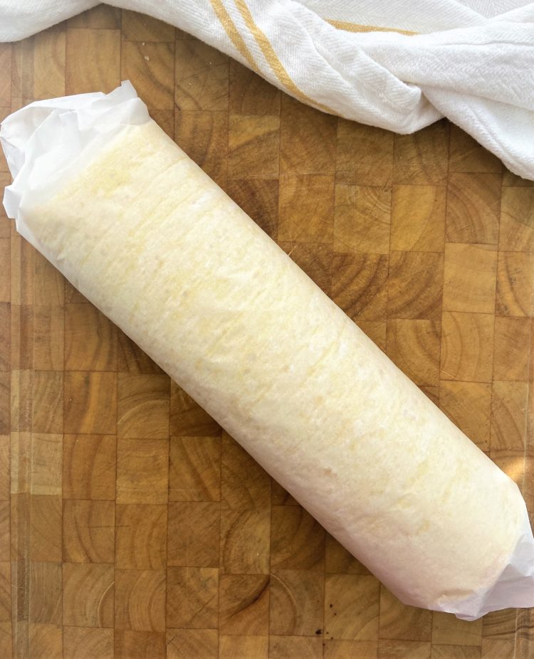 rolled cake wrapped in parchment paper