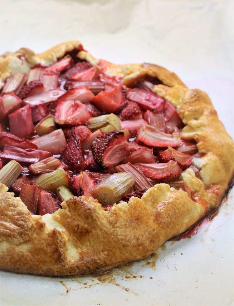 rhubarb strawberry crostata on parchment paper