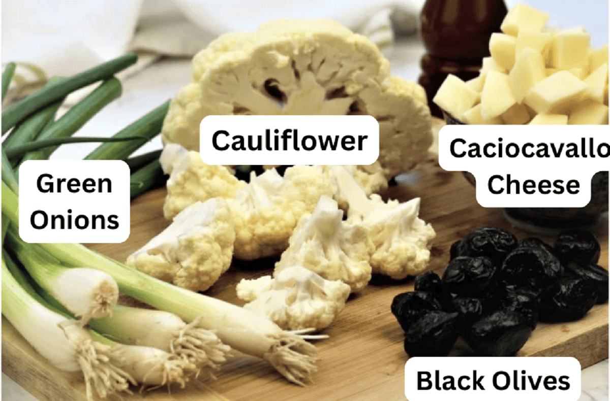 Scacciata with Cauliflower and Black Olives (No Knead Recipe) Cauliflower, caciocavallo cheese, black olives and green onions for scacciata recipe.