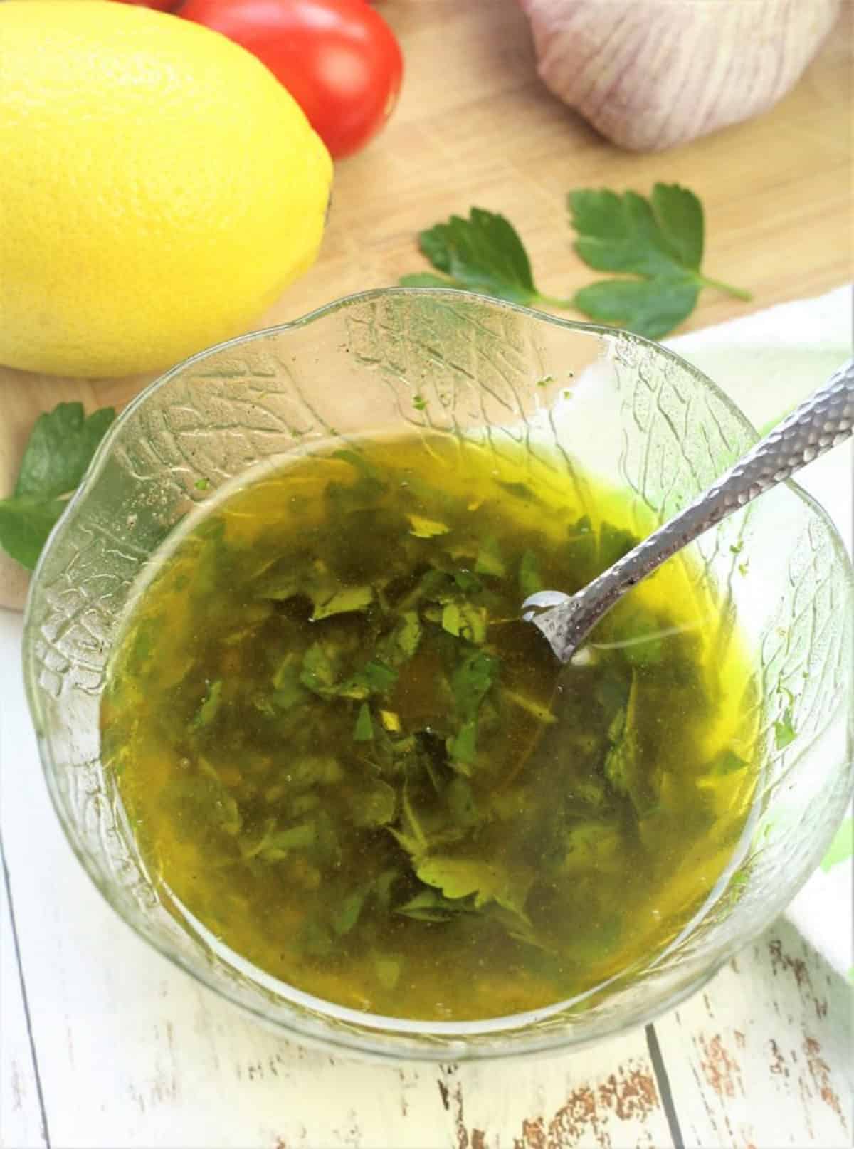 Olive oil, parsley, lemon juice and garlic salad dressing.