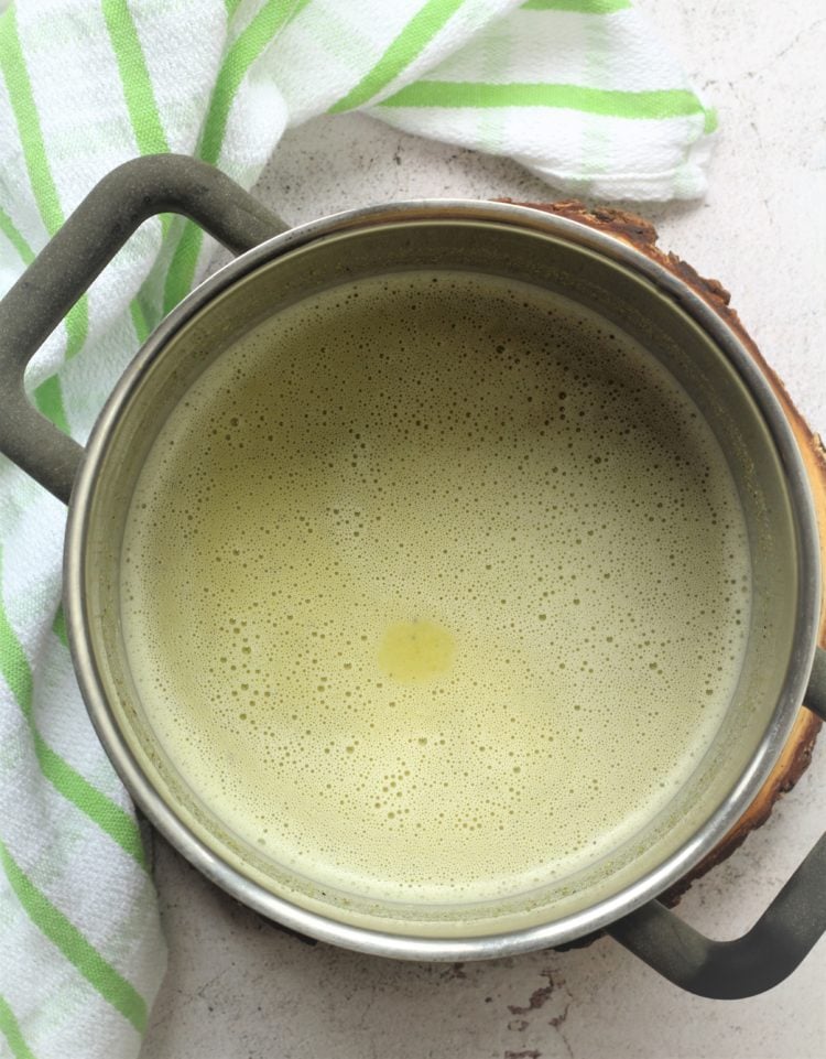 pistachio paste infused milk in sauce pan