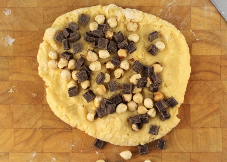 hazelnuts and chocolate chunks on biscotti dough
