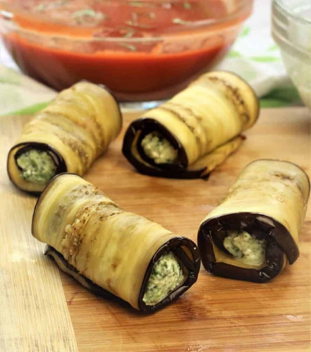 Spinach and ricotta filled eggplant rolls.