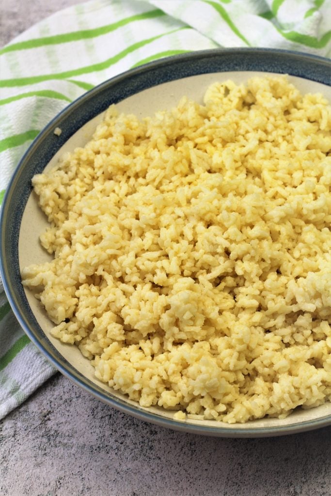 cooked arborio rice in large bowl