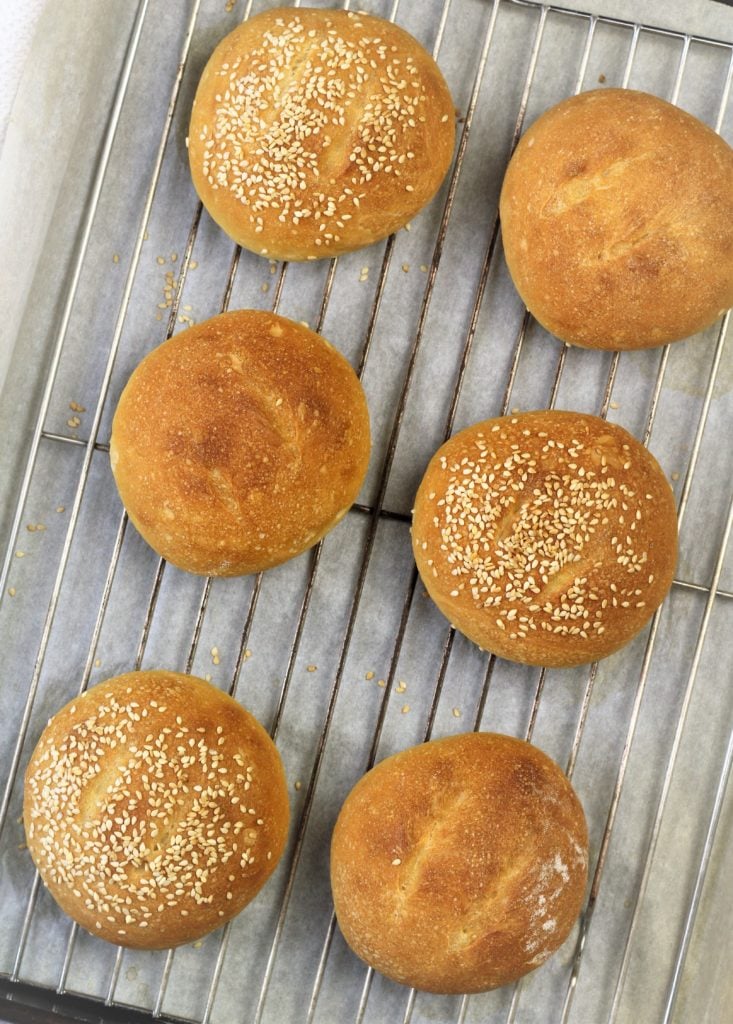 semolina bread with sesame seeds on wire rack